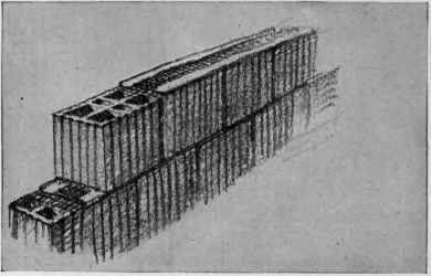 Showing the use of metal lath in the joints of vertically webbed hollow tile, to prevent the dropping of the mortar into the voids and also allow the separation of mortar joint