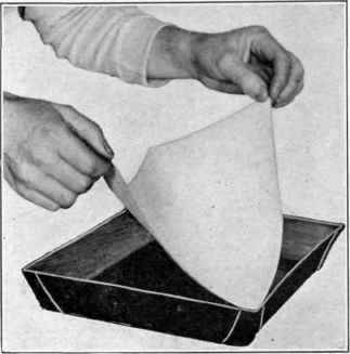 Illustration No. 52 Sensitizing the Paper   Lowering onto the Bath