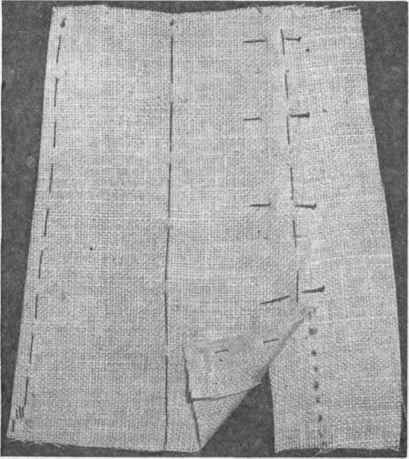 FIG. 193.   Pinning and basting panel to gore.