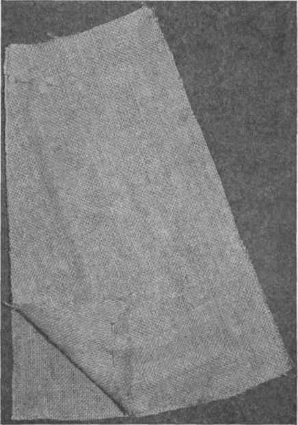 Fig. 194.   Pinning a straight and bias edge for basting.