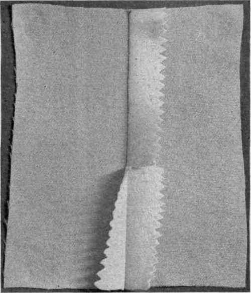Fig. 212.   Cloth seam, stitched, pinked and pressed together or open.
