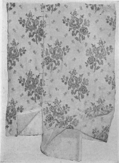 Fig. 7.   Chiffon Brocade, illustrating waste of material in width when matching pattern of design.