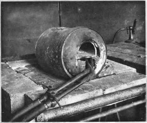 Fig. 150. Inexpensive bomemade enameling' muffle.
