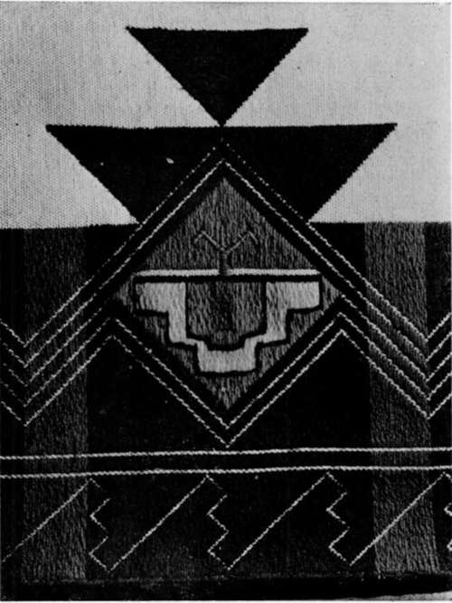 Detail of white embroidered robe