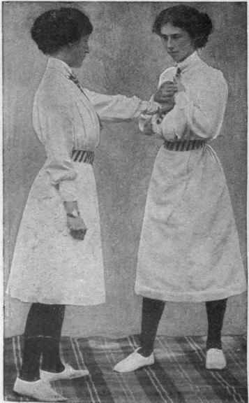 Fig. 7. The first movement of a trick which will reduce attacker's hand to the chest and securing it there