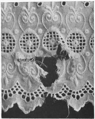 Fig. I. A jagged tear in a piece of embroidery edging, such as here shown, can be mended so that the damage is invisible