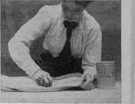 For cleaning light'coloured cloth garments, kitchen salt; crushed to a fine powder, should be applied with a pad made of white linen a couple of small bowls of petrol out of doors, and rolled one's own sleeves up above the elbows, if evening gloves are to be manipulated, proceed as follows: