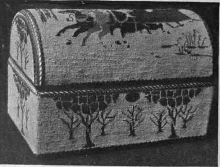 Trunk box for trinkets or jewel cases worked in petit point in natural coloured wools. Height 10 inches, lined with white satin and bordered with old gold galon