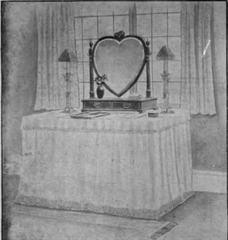 A simple dressing table which is most effective with its dainty draperies and heart shaped mirror