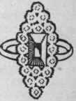 Fig. 9. A marquise ring, in which a central emerald is surrounded by diamonds