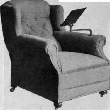 The ideal chair for a quiet evening the large lounge shape, well upholstered and fitted with a reading stand