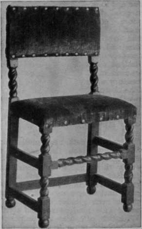 A Jacobean chair reproduced from a fine old original and upholstered in antique velvet