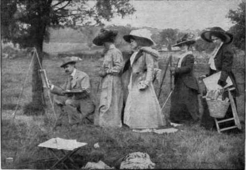 A demonstration lesson out of doors. The master painting a landscape before a class of students