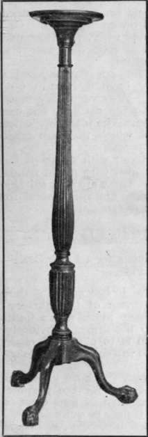 A palm stand in the form of an old mahogany bedpost, a pattern which is always popular and takes but little room
