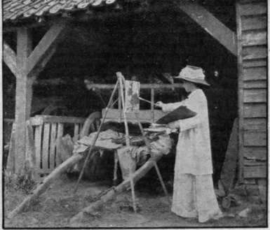 A student of the outdoor sketching class at work. Pupils are encouraged to make studies quickly out of doors, which ate worked up later into finished pictures