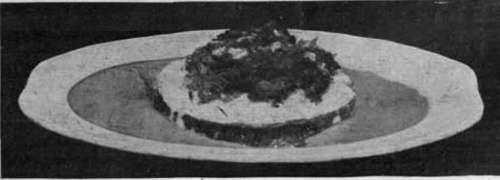 Baked Cod Steak. A delicious method of serving cod. The forcemeat seasoning is a great improvement to the fish, and makes the dish