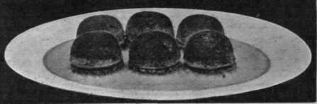 Bouchees de Poulet the string, and put it on a hot dish. Pour, over it some good onion sauce, and garnish the dish with neat rolls of toasted bacon.
