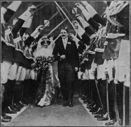 A military wedding, the bride and bridegroom passing under an arch of swords, formed by men of the bridegroom's regiment