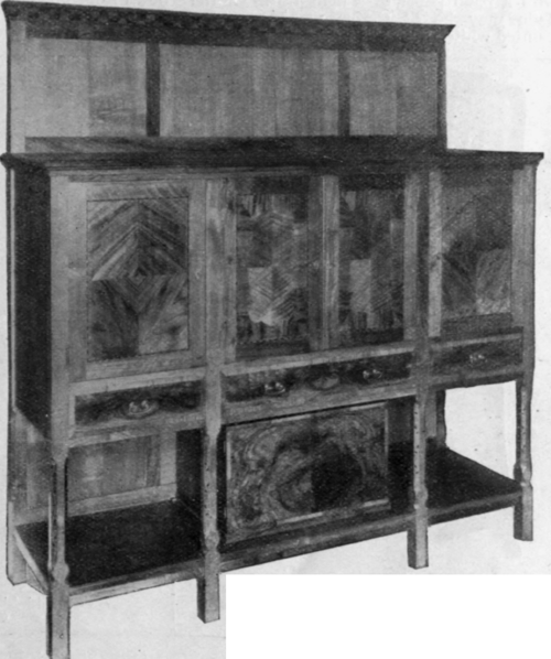 A modern sideboard showing a convenient arrange ment of cupboards and drawers. Since it is no longer customary to carve at a sideboard, this model is preferable to the old form with a table part Hamilton T. Smith
