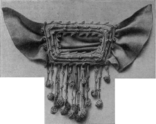 A really handsome buckle can be made of Russian braid with a knotted fringe, or this idea could be used for the ends of a stole