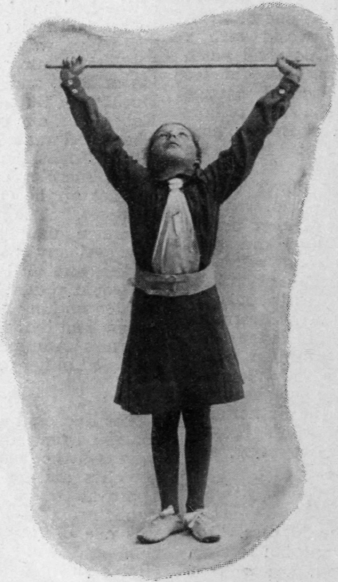 Fig. 1. Elementary wand exercises. Exercise I, position 2 Arms upward stretch, head backwards bend Photos, Stephanie Maud