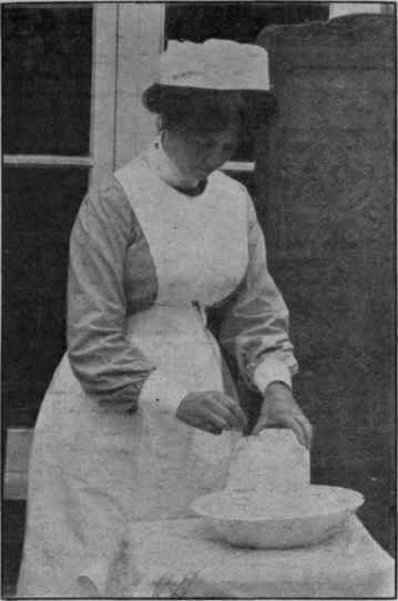 How to break away pieces of ice from a block by means of a strong hatpin or knitting needle. A large block can be bought from a fishmonger for from 9d. to 1s.