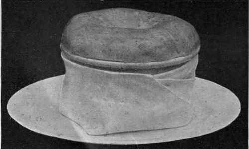 Steak and Oyster Pudding. Served in the basin in which it is cooked. The crust should be as light as possible