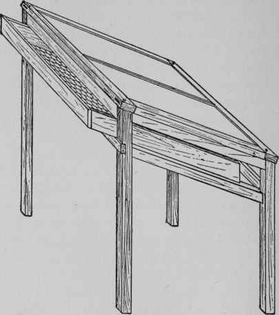 >Fig. 13 - A home-made frame drier with glass top. The removable tray or drawer has a fine mesh wire bottom.