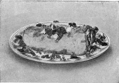 Roast Saddle of Mutton garnished with circular pieces of toast, small circular pieces of currant jelly, radishes cut