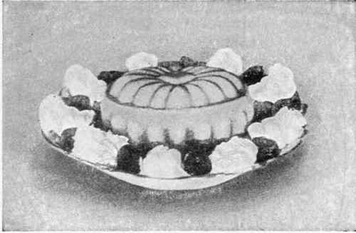 Harvard Pudding served with Crushed Berries and Whipped