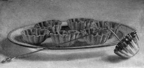 Fontage Iron And Cups.