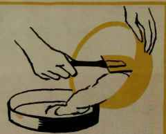 Break the eggs into a saucer with a kitchen knife.