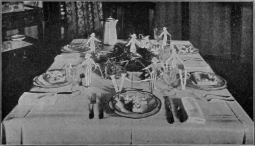 A Luncheon Table Decorated for a Suffrage Function. The Entree is served in Paper Cases Shaped to Form the Letters in 