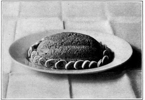 Cold Oatmeal molded and garnished with Sliced Bananas.
