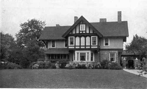 BASE PLANTINGS Fig. 82. We show a correct use of deciduous shrubs as a base planting. The outline of base plantings should always be sinuous, extending out at the corners and receding to the face of the building. See page 85.