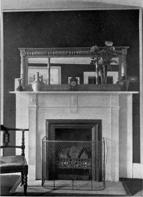 MANTELPIECES DIRECTLY OVER EACH OTHER IN THE SAME APARTMENT HOUSE