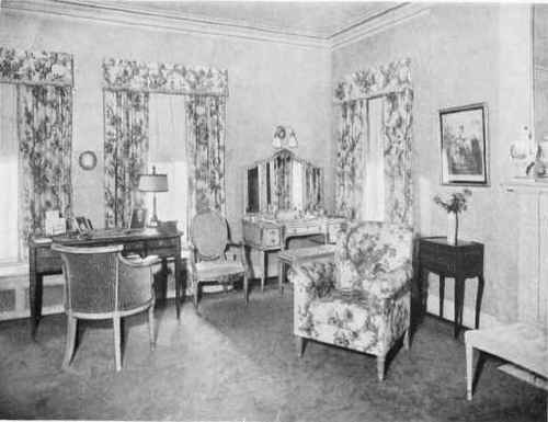 A BEDROOM IN LOUIS XVI STYLE, CHAIR TO LEFT, DIRECTOIRE.