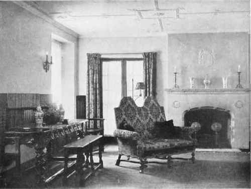 A LIVING ROOM WITH STUART AND WILLIAM AND MARY FURNITURE.