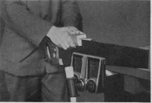Fig. 24. Jointing a Saw.