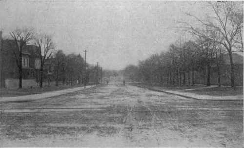 Example of too wide street. Street narrowed from 100 feet to 56 feet. Sidewalks moved to edges of driveway. Expense of maintaining driveway reduced one half and desirable parking effects obtained. Macon, Ga.