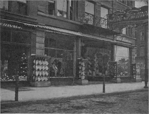 Good store front. Wide and low windows. Piers covered by showcases. Summit Street, Toledo.
