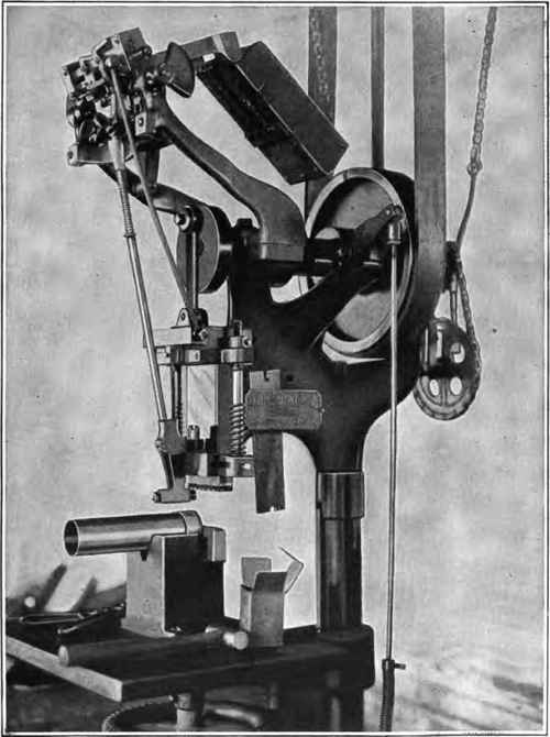 Machine used for nailing plug to shell.